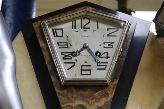 A French Art Deco bronzed spelter and marble mantel clock, the dial signed Divay height 58cm